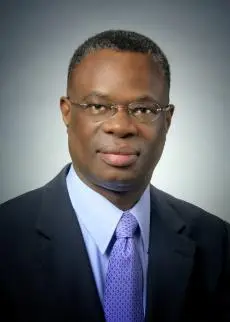 headshot of Alimi Banjoko